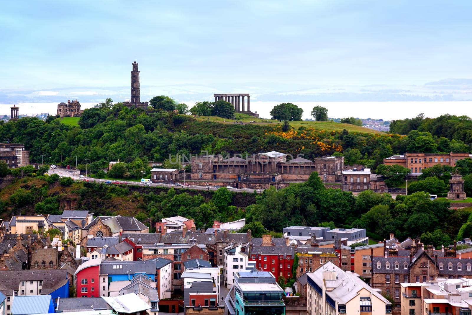 View on Calton Hill and Old Royal High School (also known as New Parliament House) from Holyrood Park, Edinburgh, Scotland, UK