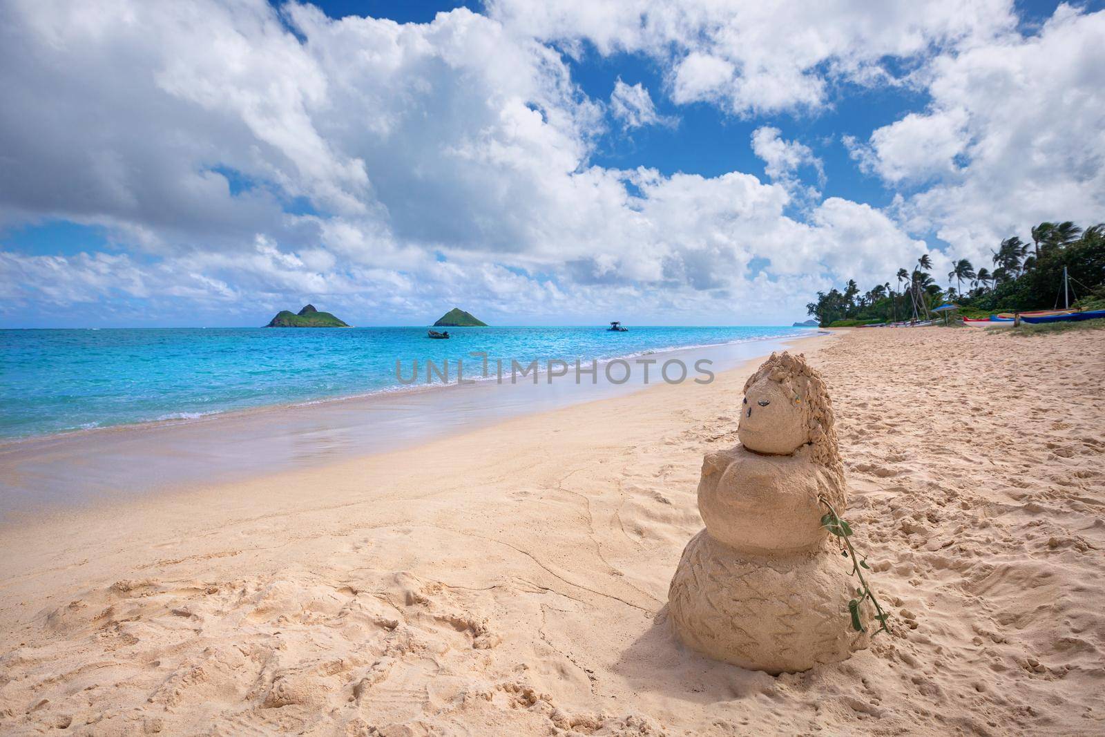 sandy woman on Lanikai Beach and Mokulua Islands, O'ahu, Hawai'i by zhu_zhu