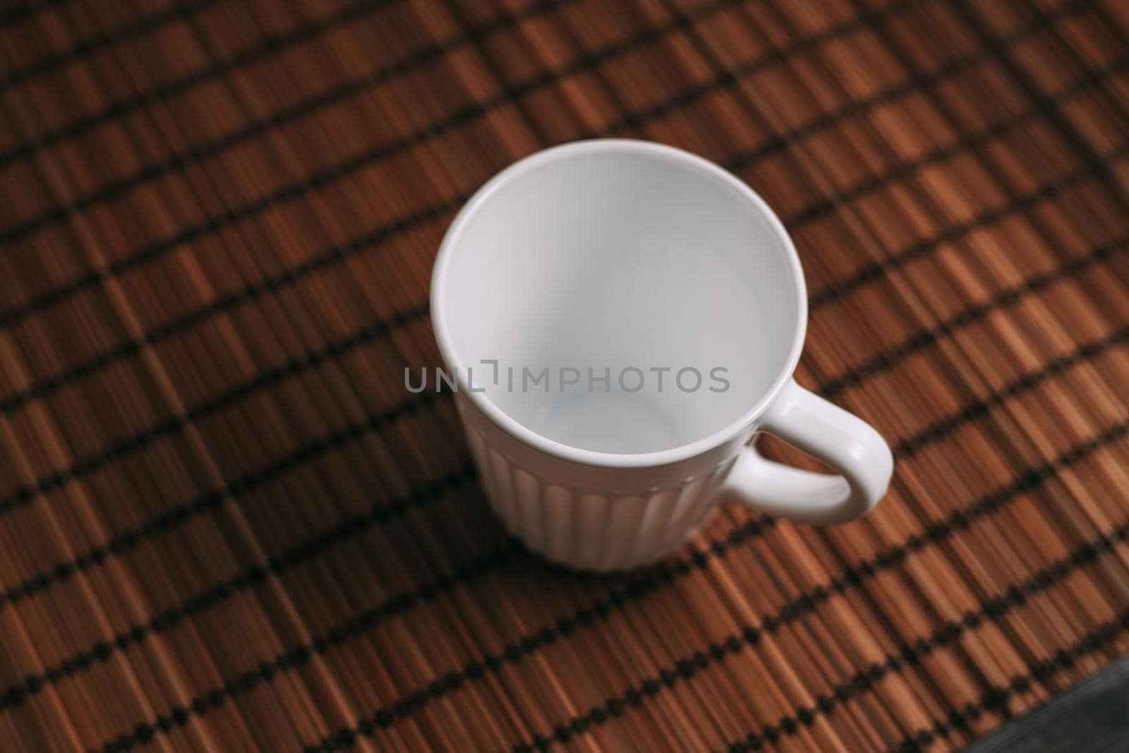 white mug on table wooden stand texture background images by SHOTPRIME