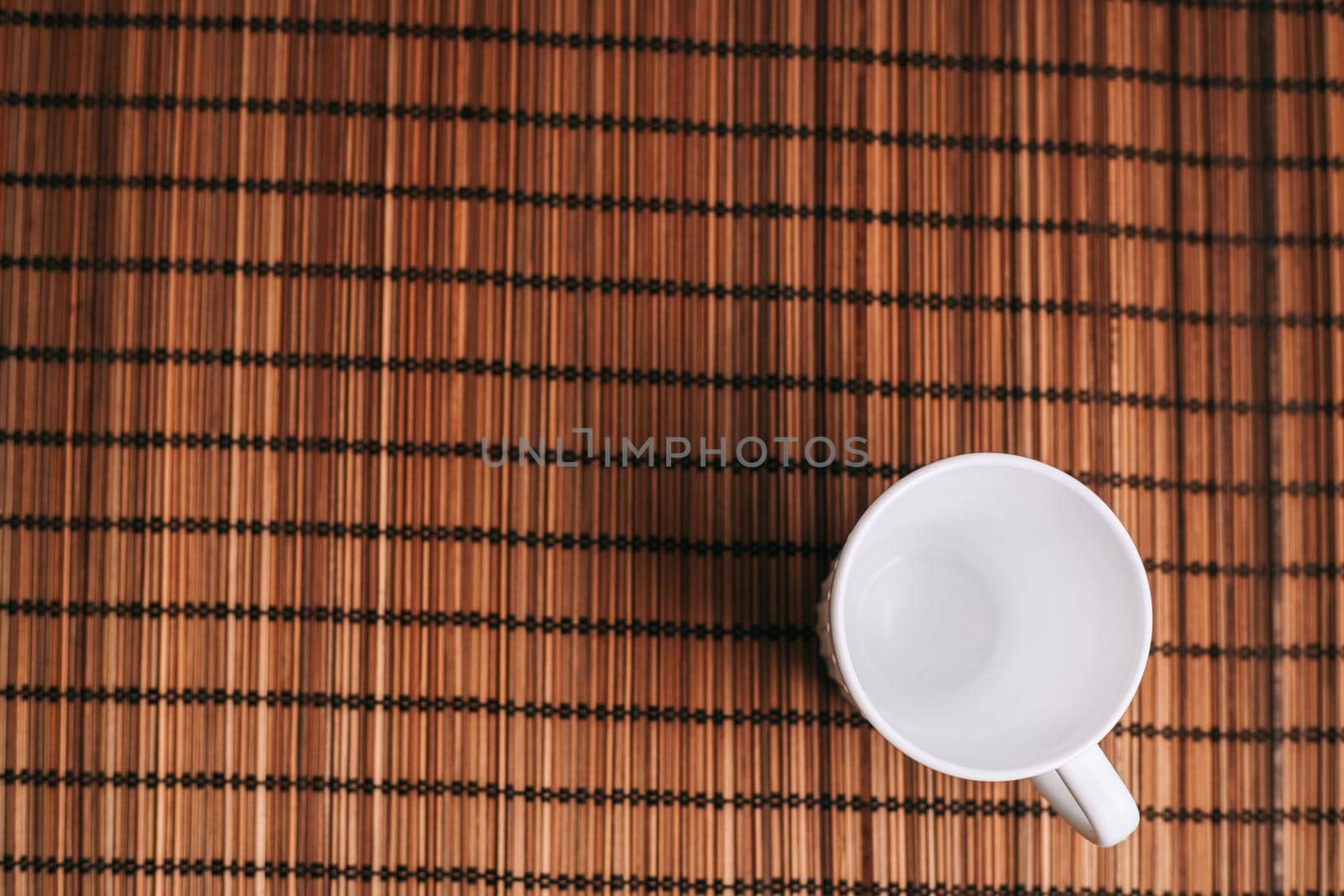 white mug on table wooden stand texture background images. High quality photo