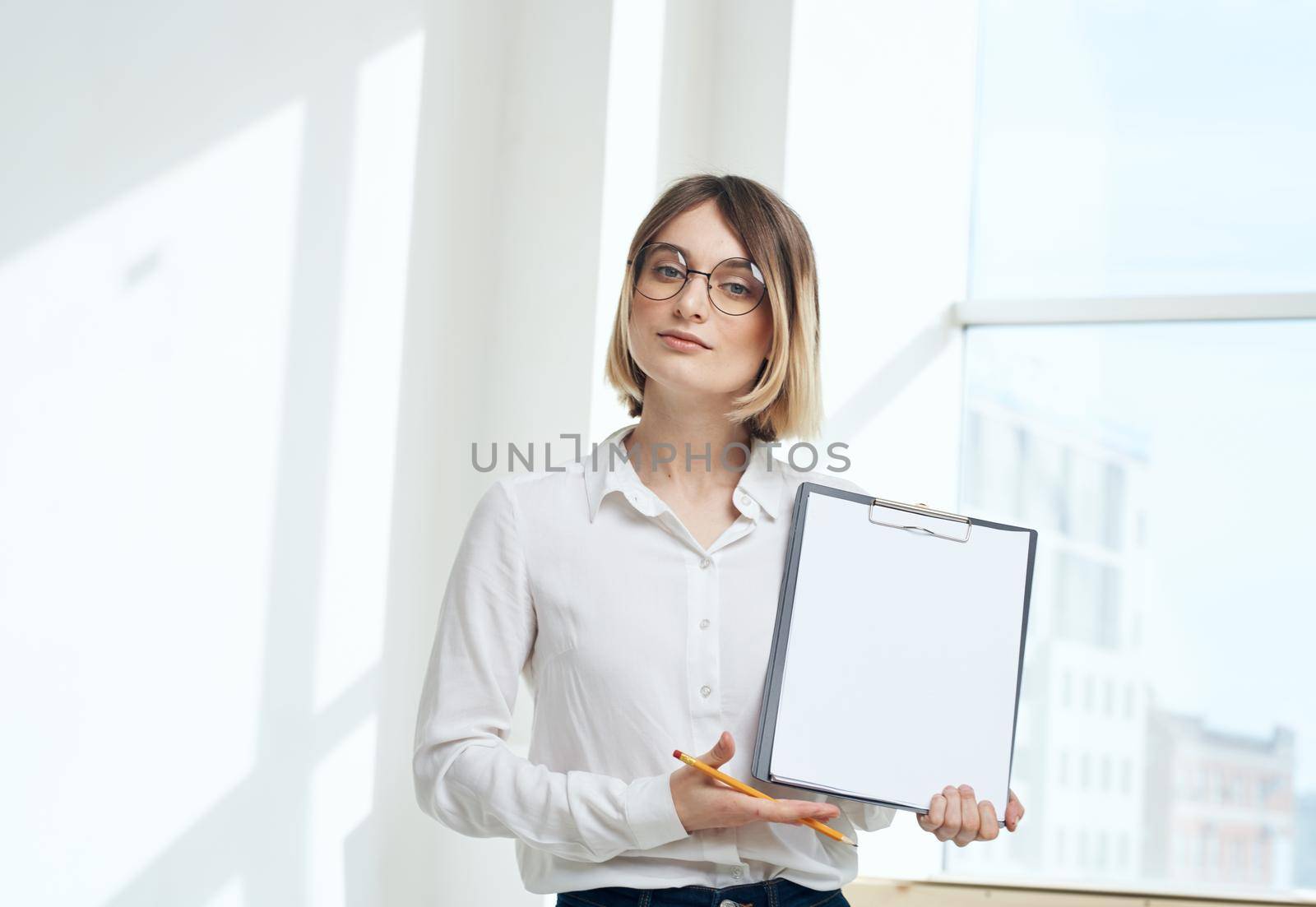 room finance woman business documents interior window. High quality photo