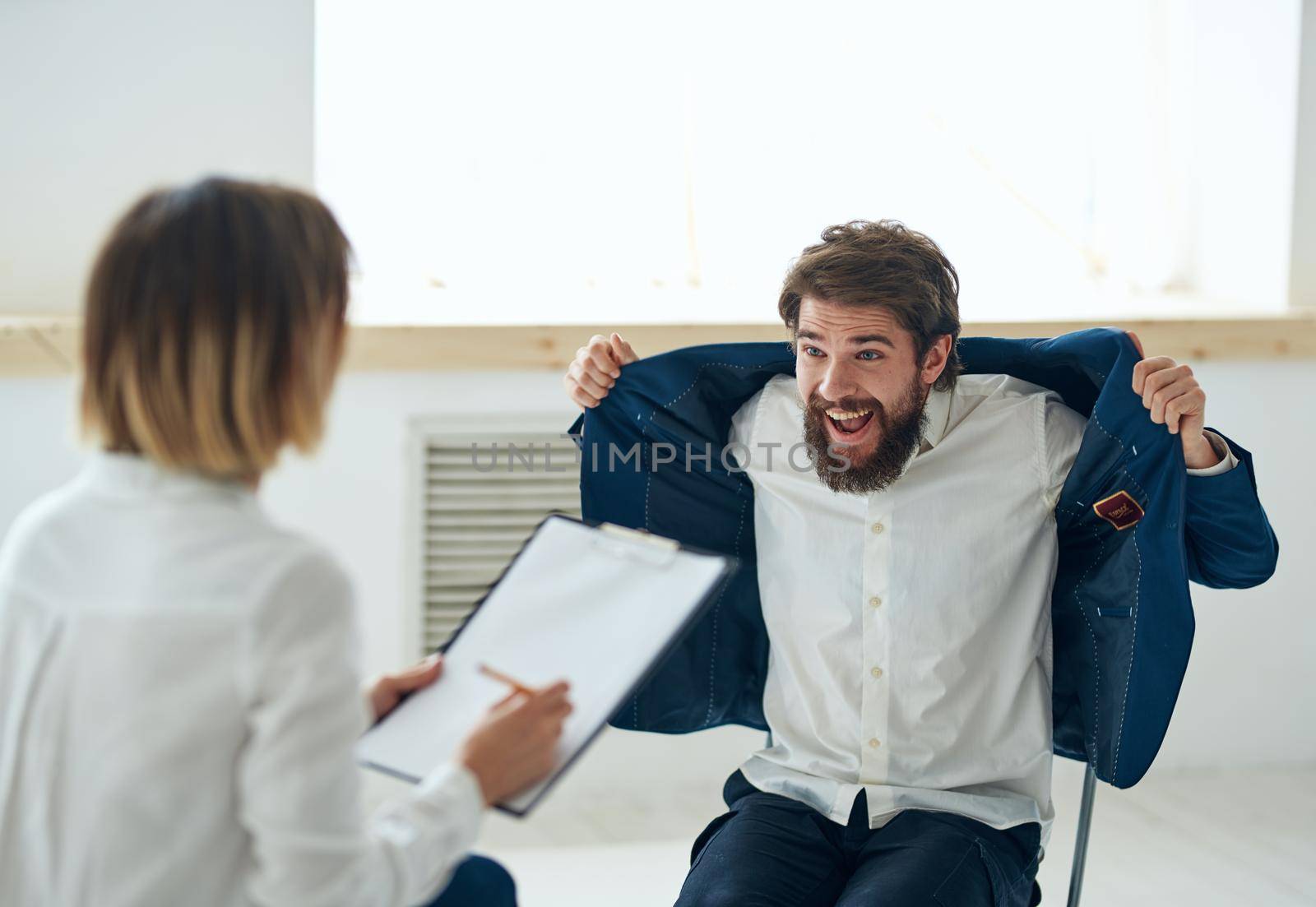 Emotional man at a psychologist's consultation mental health problems by SHOTPRIME