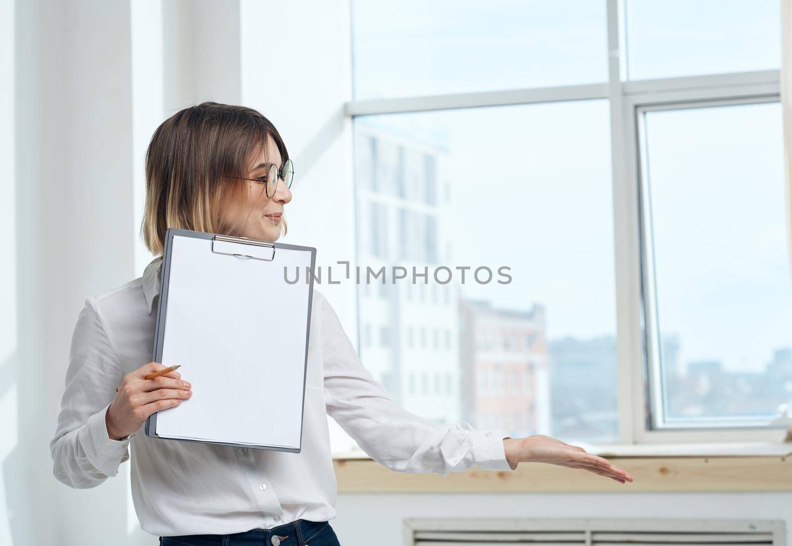 room finance woman business documents interior window. High quality photo