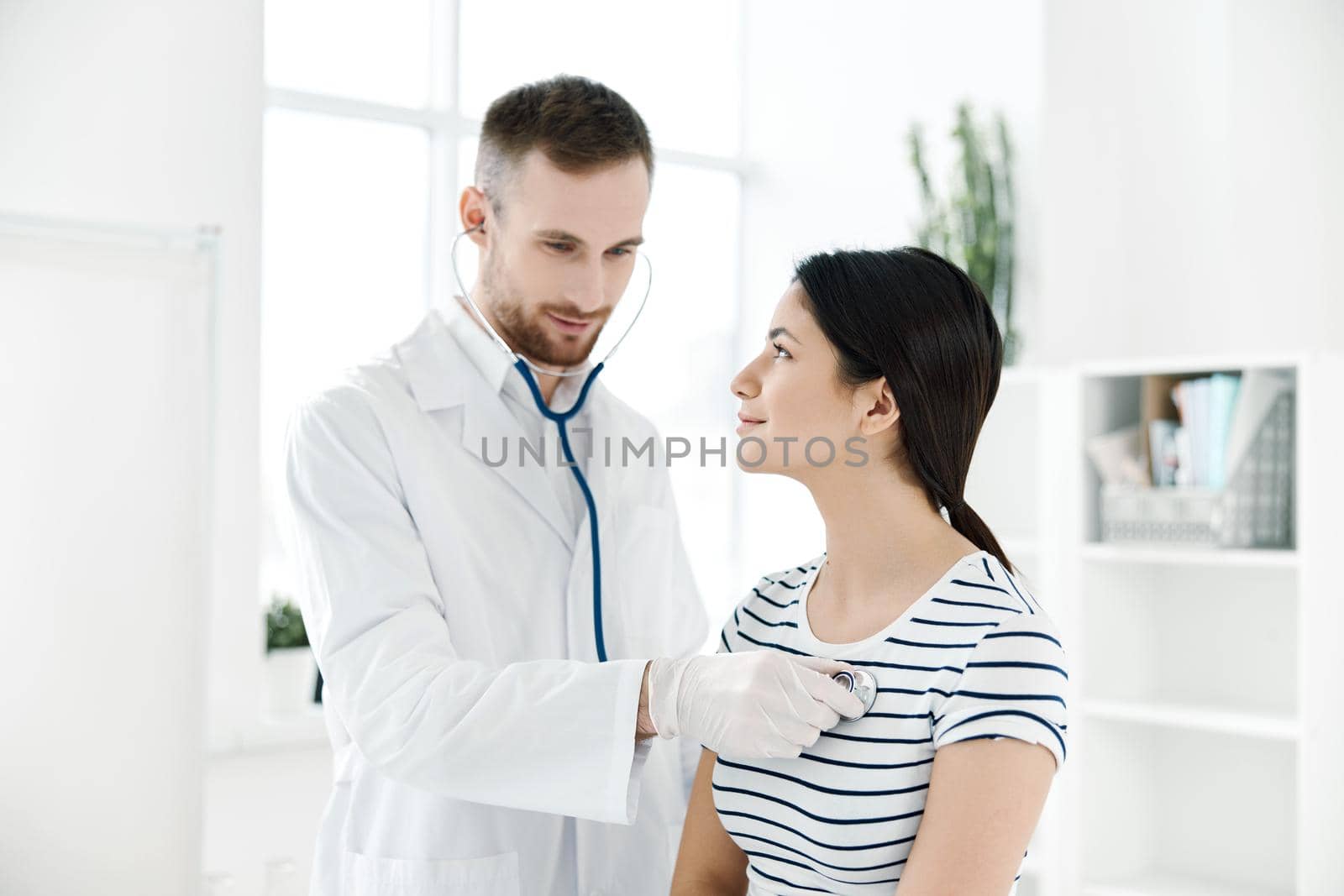 male doctor examines a patient in health hospitals. High quality photo