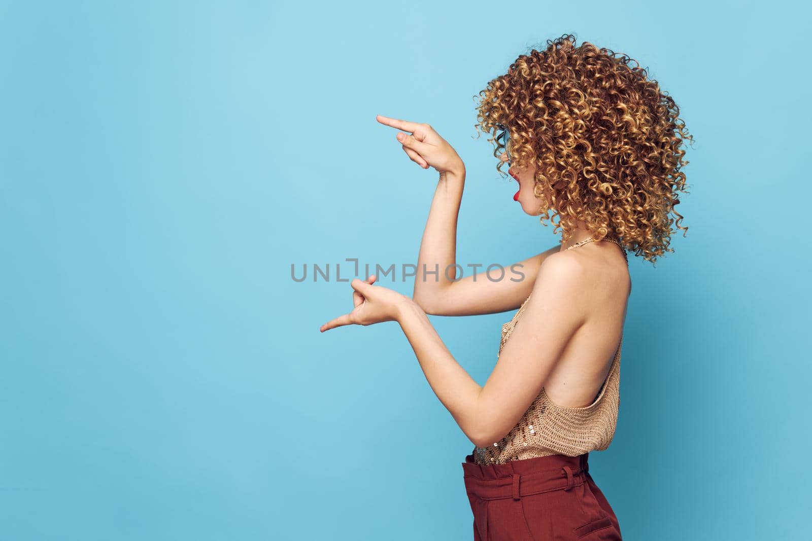 Attractive woman Curly hair model lifestyle bright makeup isolated background
