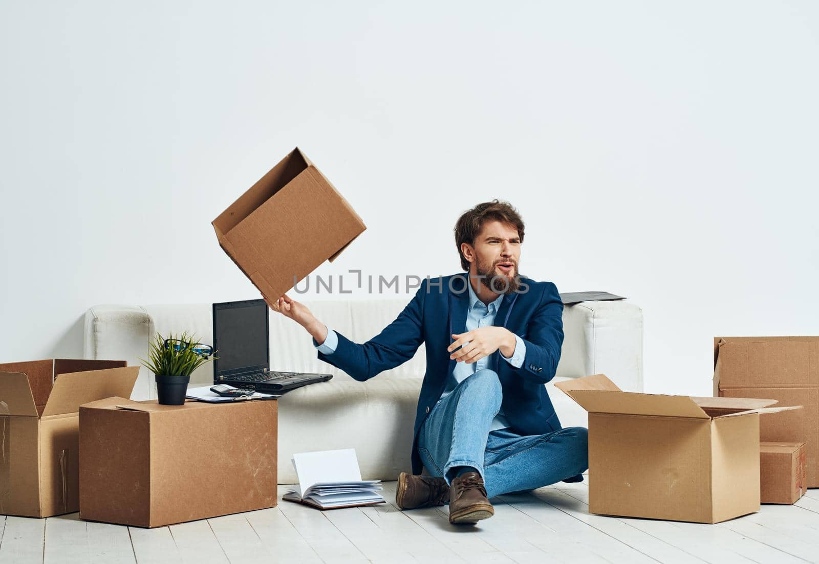 Business man boxes with lifestyle things packing office moving. High quality photo
