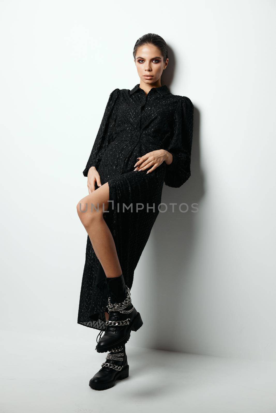 brunette bright makeup fashion modern style black dress. High quality photo