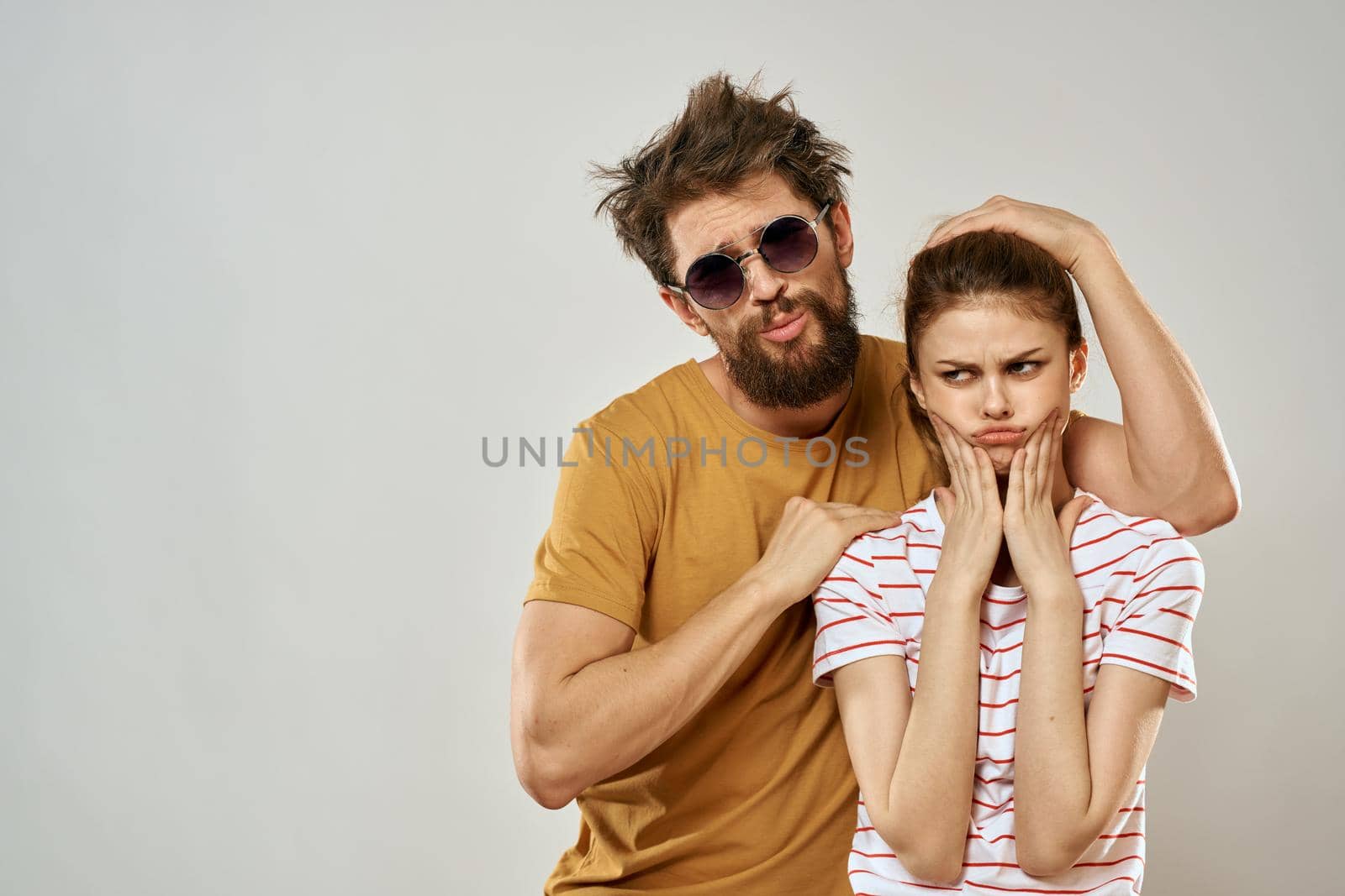 young couple fun friendship lifestyle message gray backgrounds. High quality photo