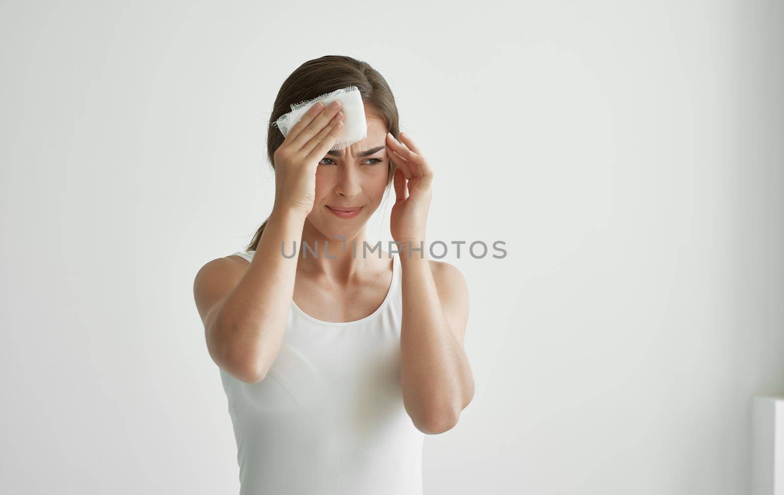 woman wiping her face with a handkerchief feeling unwell health cold. High quality photo