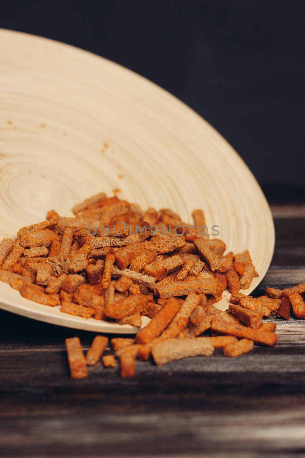 crackers for beer snacks crunch on wooden table by SHOTPRIME