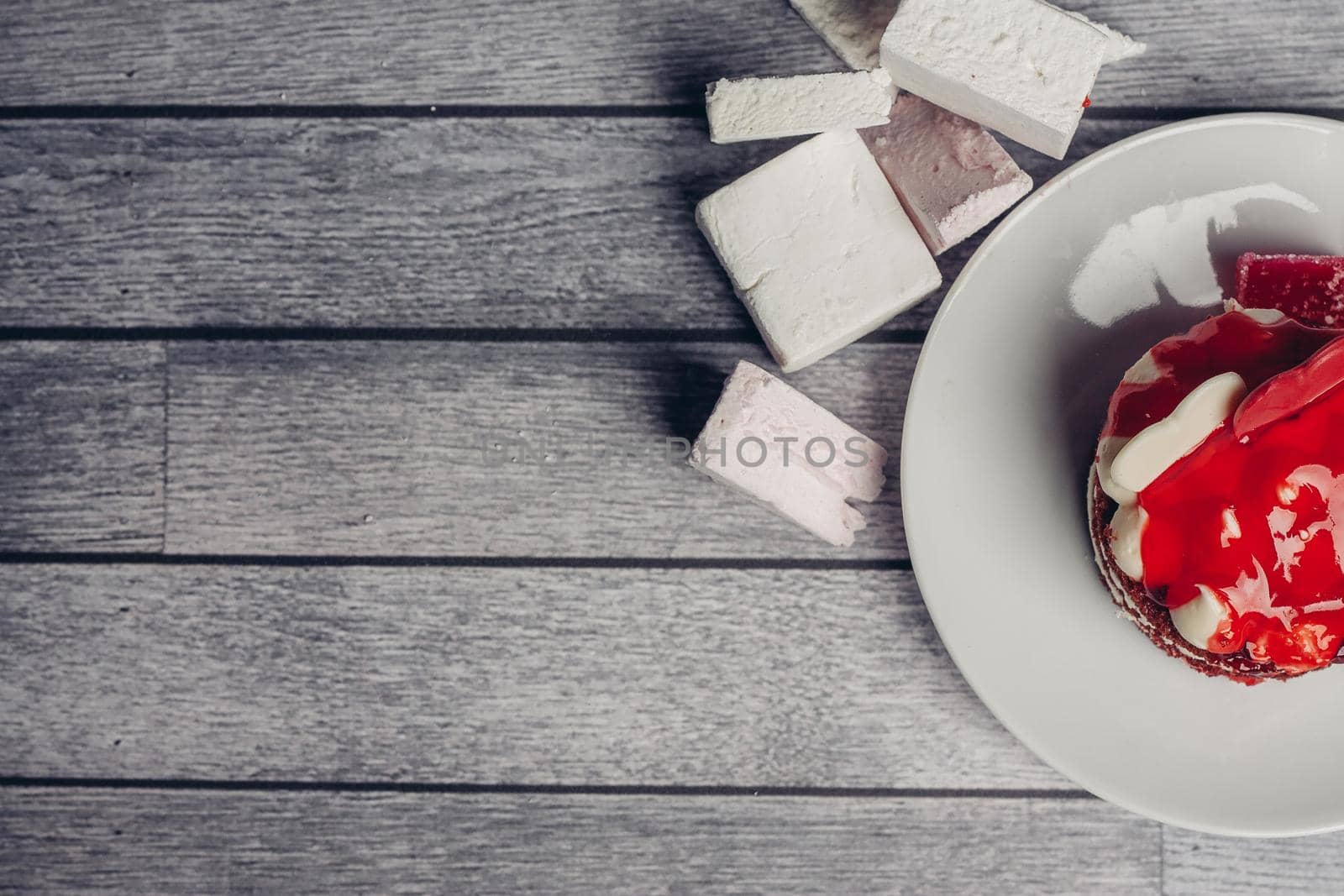 red round cake sweets meal dessert with tea wooden background. High quality photo