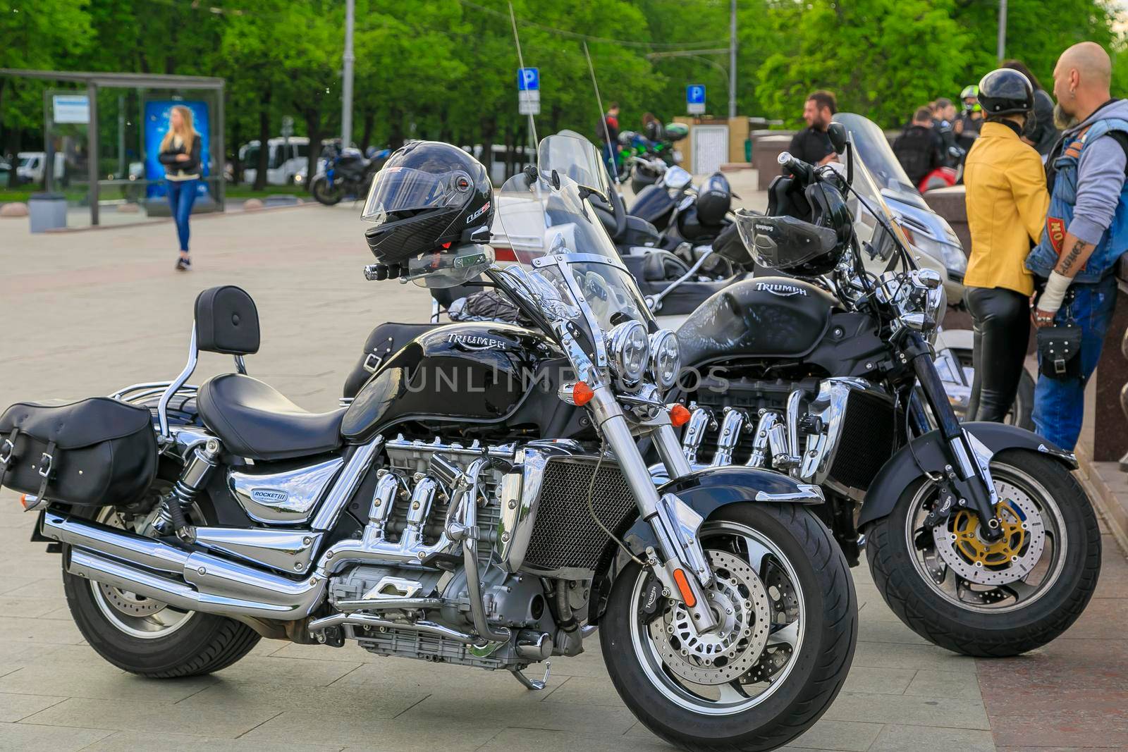 Beautiful motorcycles bikers are parked outdoors in the park. Moscow, Russia, May 13, 2019