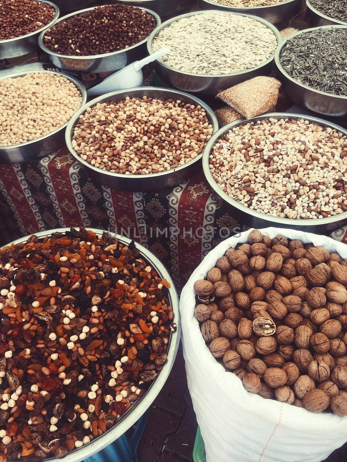 Nuts and seeds in bags in the traditional market. High quality photo