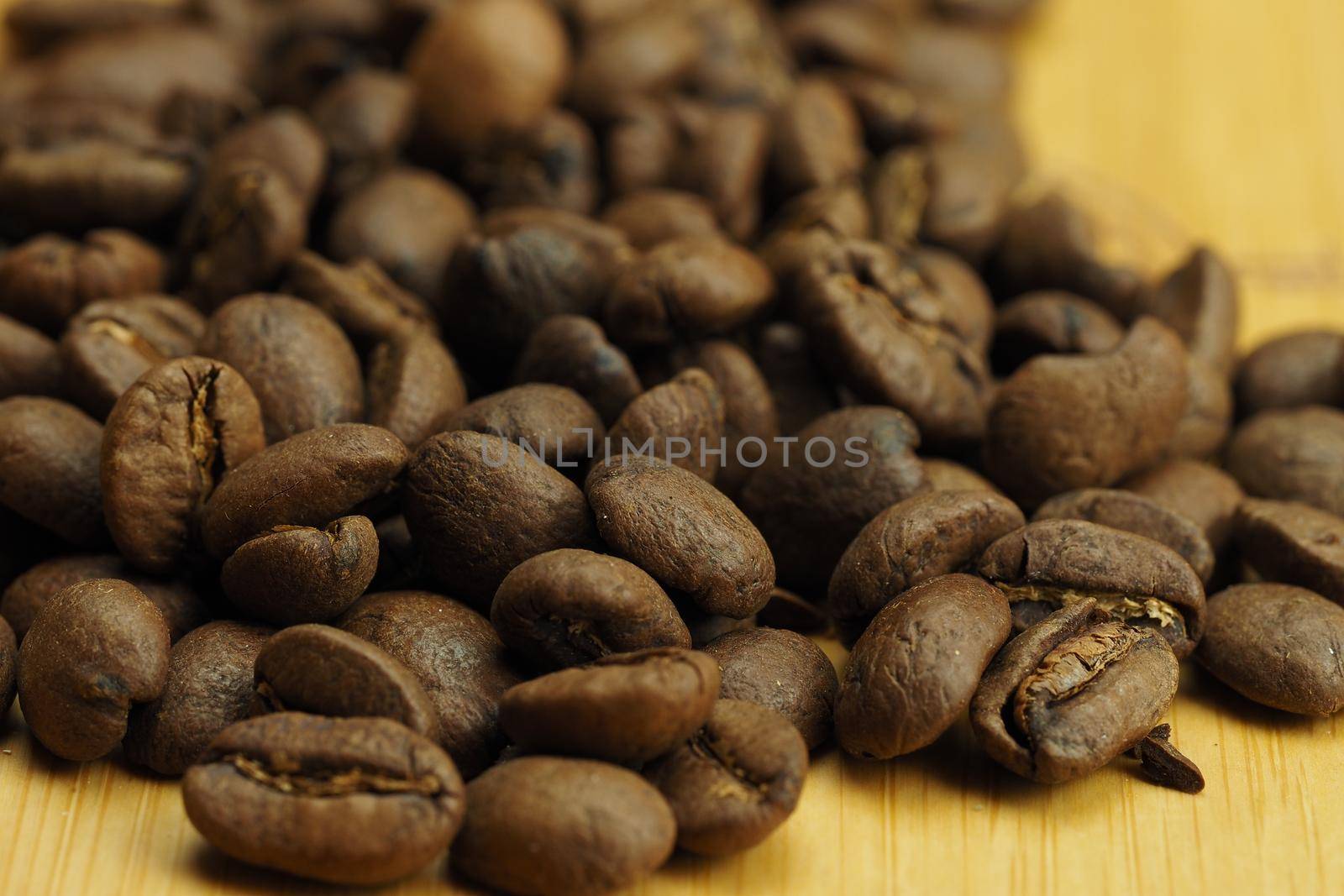 Coffee beans are brown. Beautiful side background, macro coffee. by Olga26