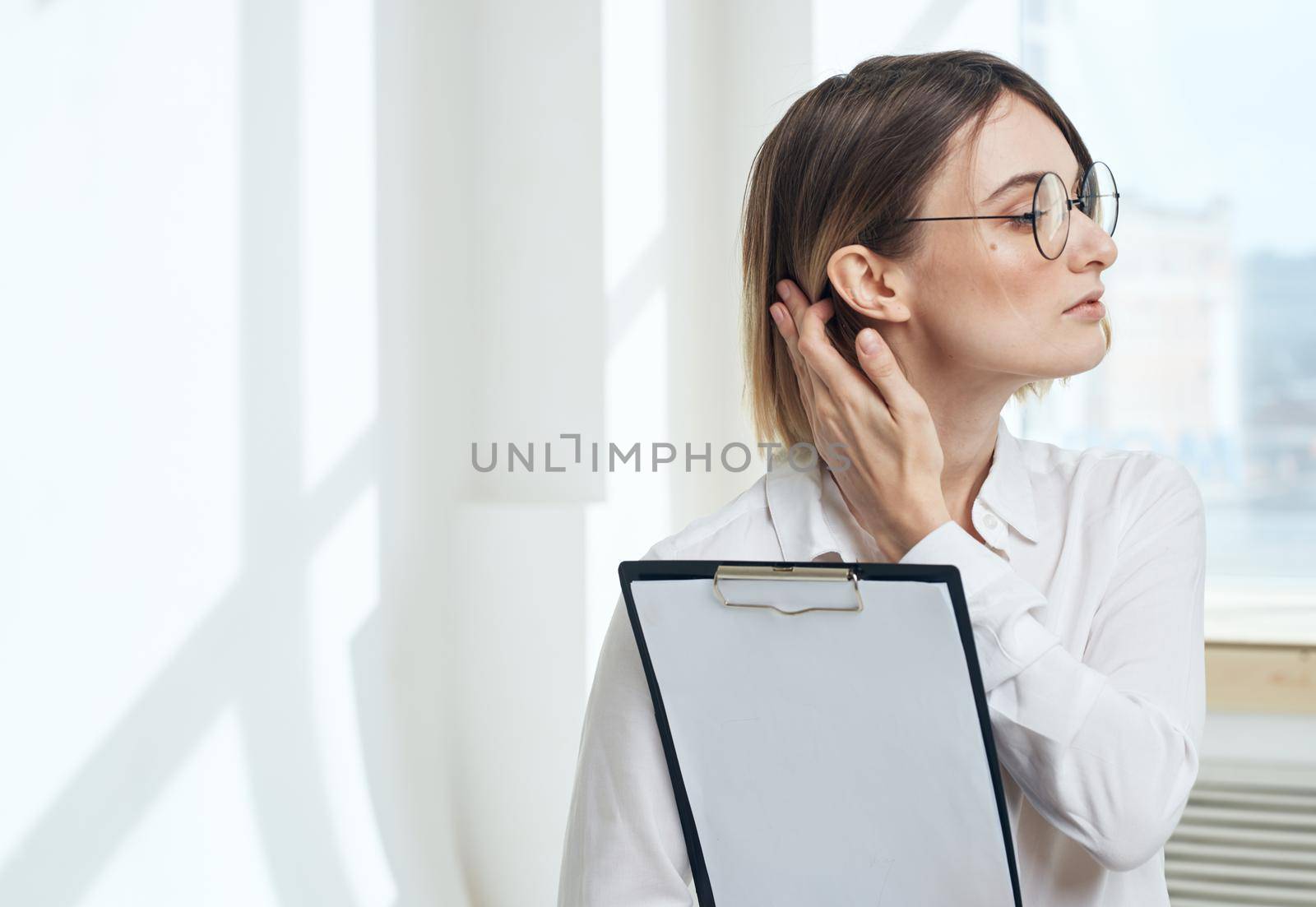 room woman business documents interior window model. High quality photo