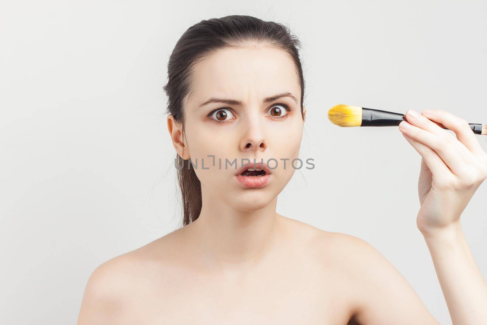 woman naked shoulders face cream skin care cropped view. High quality photo