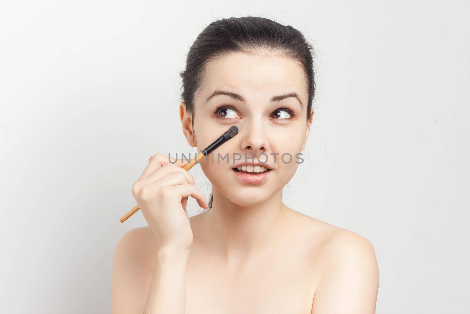 woman naked shoulders face cream skin care cropped view. High quality photo