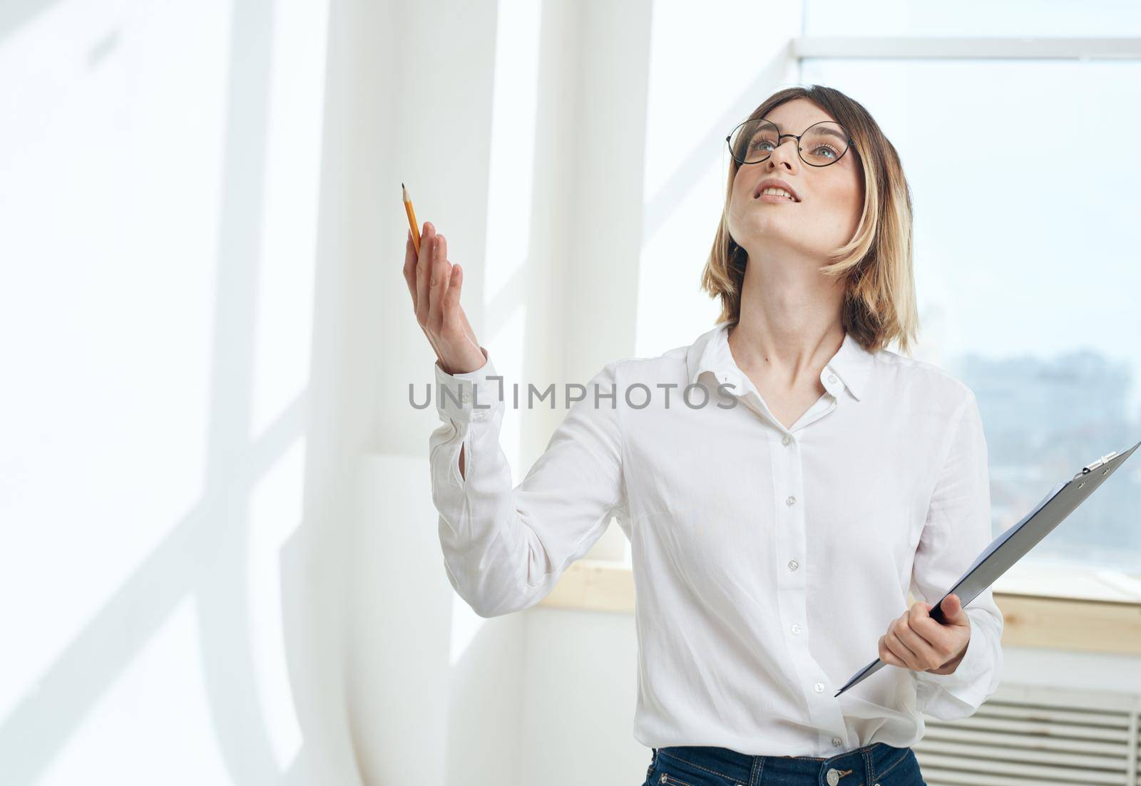 Woman business documents interior window room finance. High quality photo
