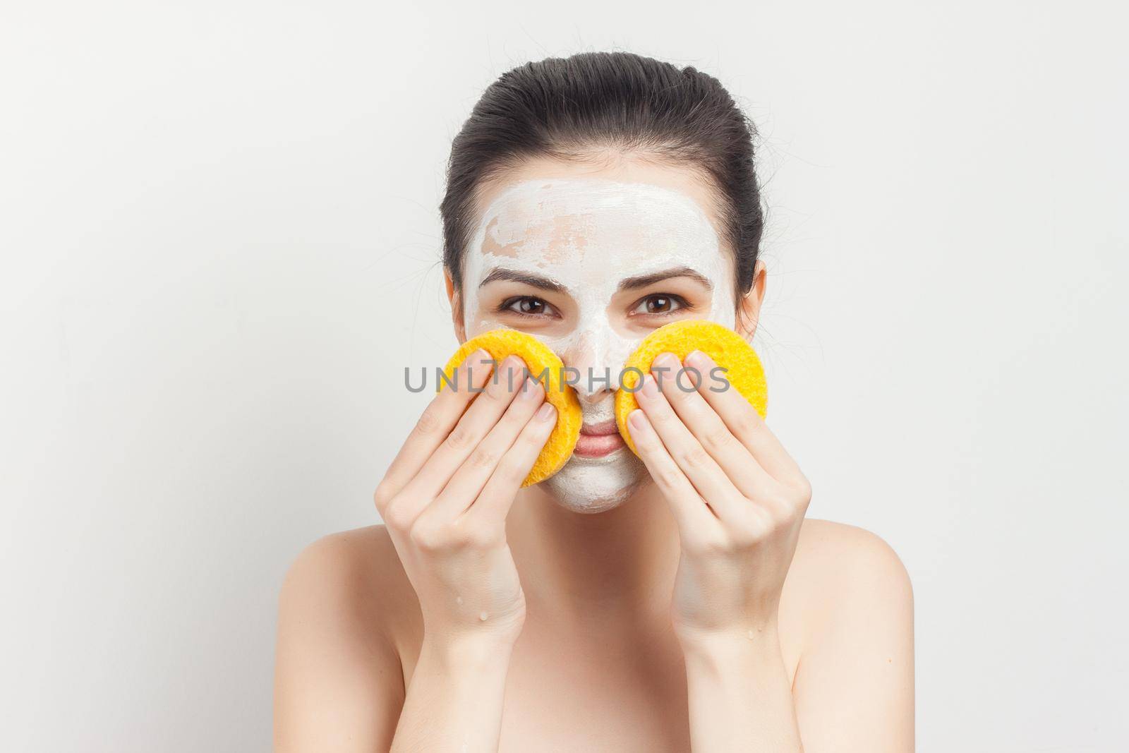 woman naked shoulders face cream skin care cropped view. High quality photo