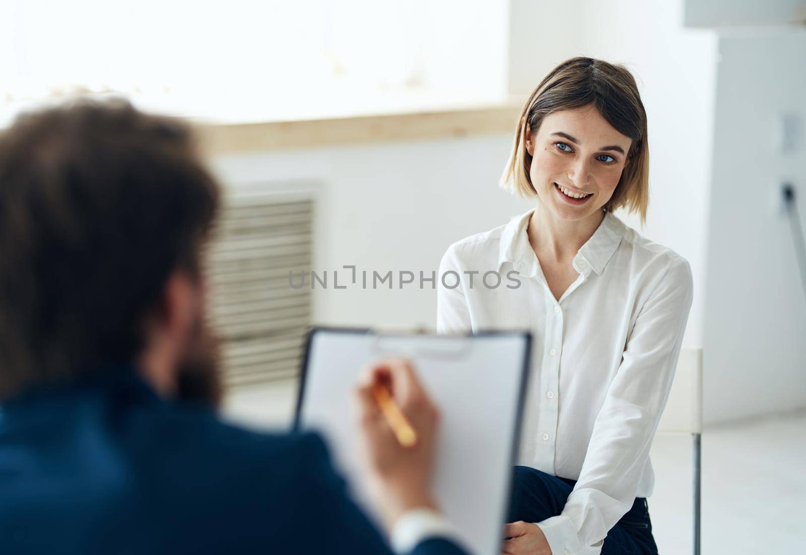 Male psychologist next to the patient diagnosis consultation treatment. High quality photo