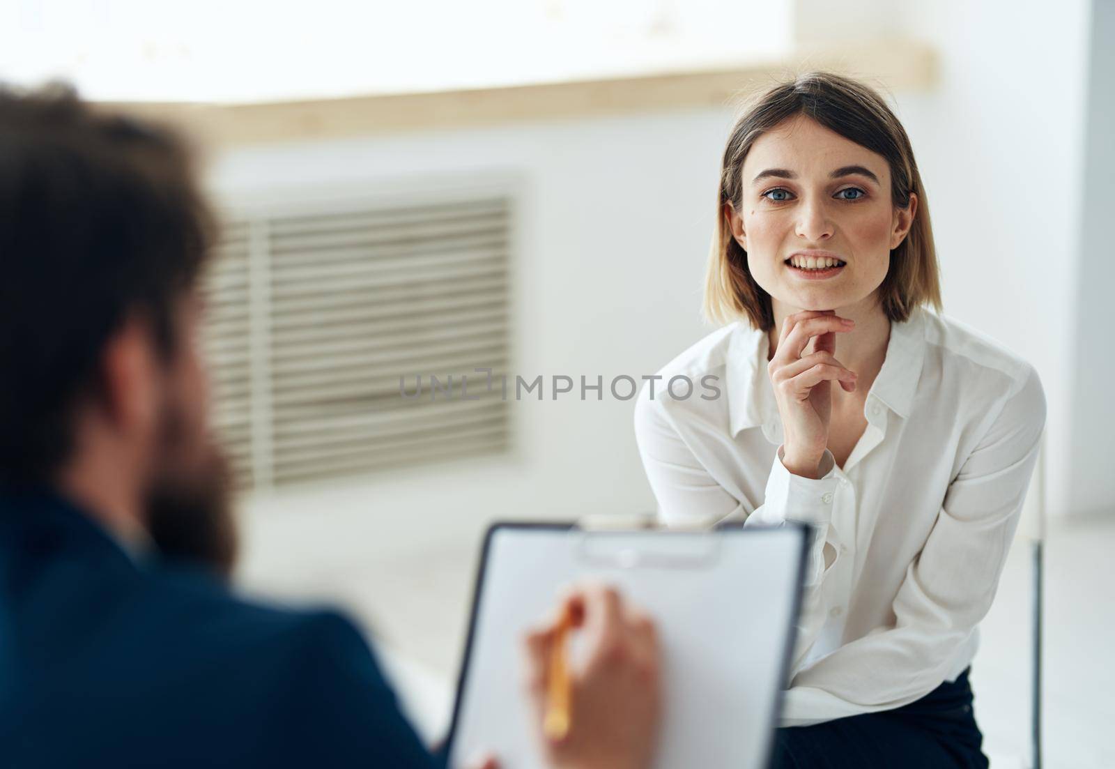 woman in consultation with a psychotherapist message health diagnosis. High quality photo