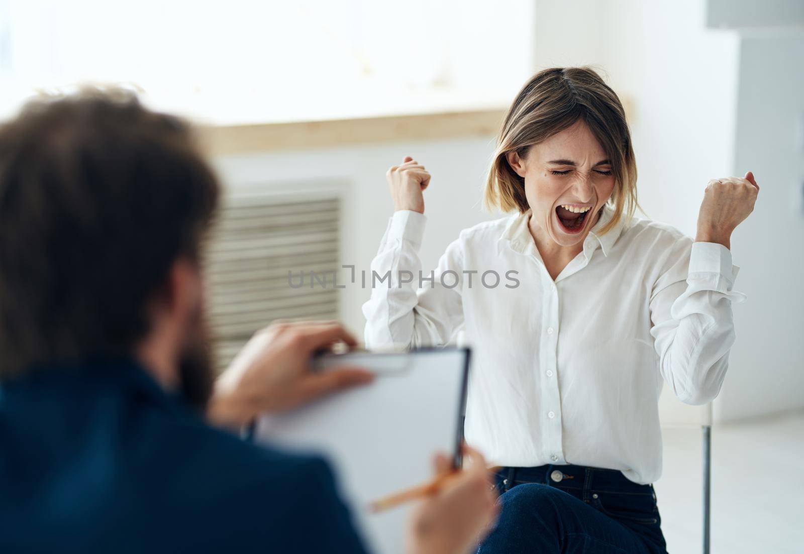 male doctor psychologist records consultation female patient. High quality photo