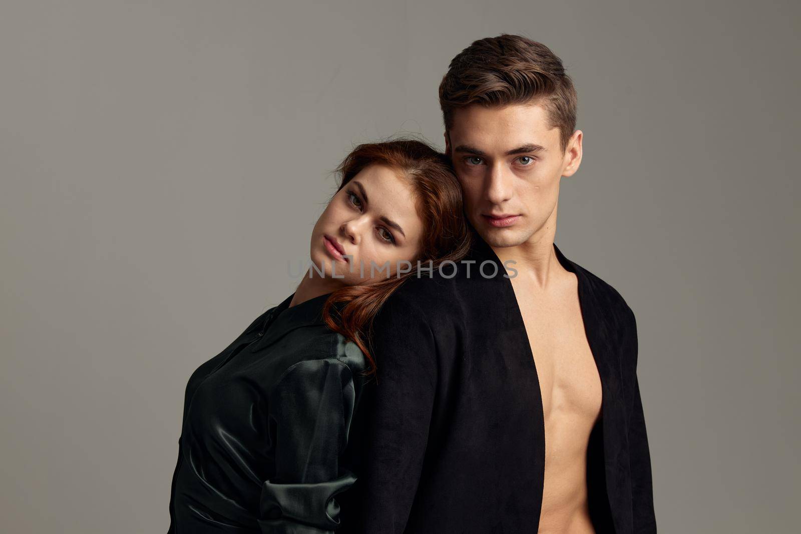 young couple posing elegance luxury romance studio. High quality photo