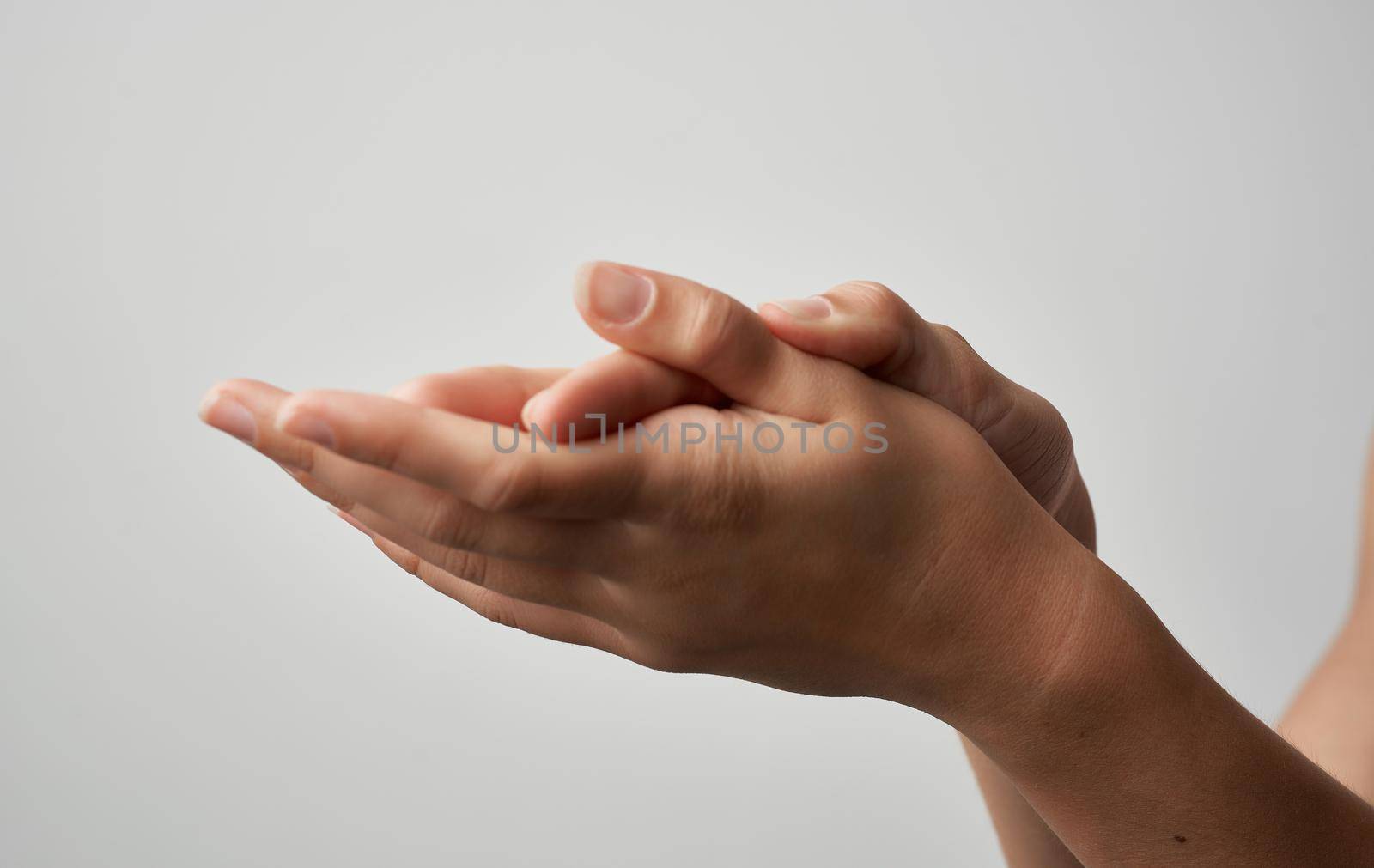 hand injury kneading recovery treatment gray background medicine. High quality photo