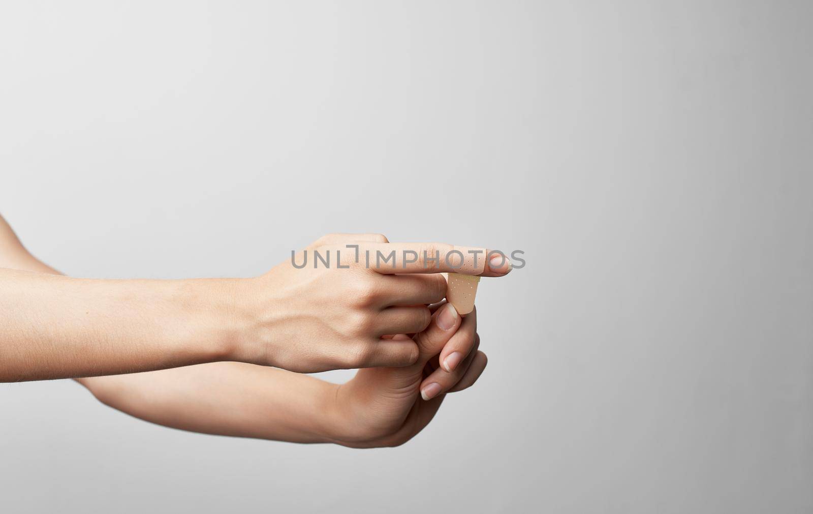 hand injury bandage health problems gray background. High quality photo