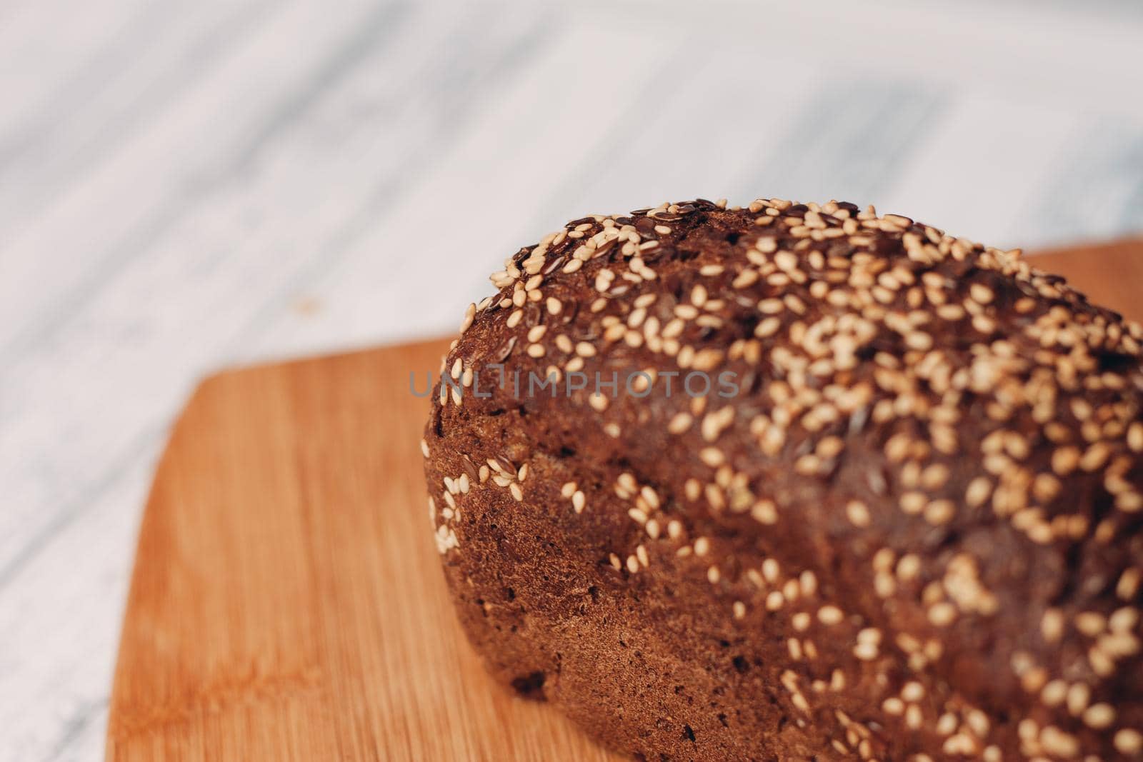 rye whole grain bread cooking home baking wood board. High quality photo