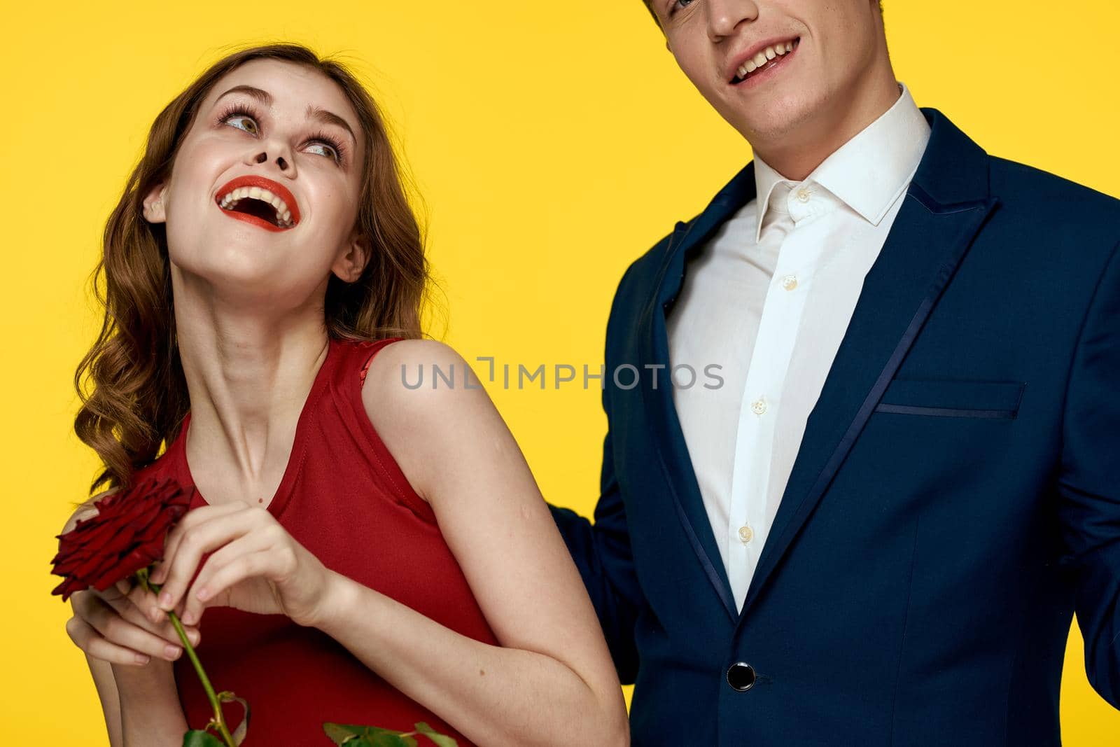 Cheerful man and woman date communication luxury roses fun. High quality photo