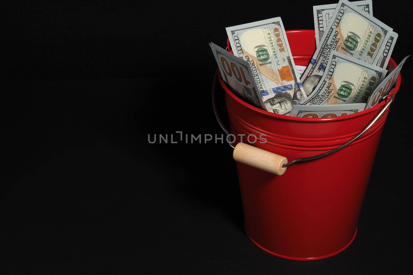 The American dollar. Business and finance. Paper bills, a lot of money. Isolated on a black background. High quality photo