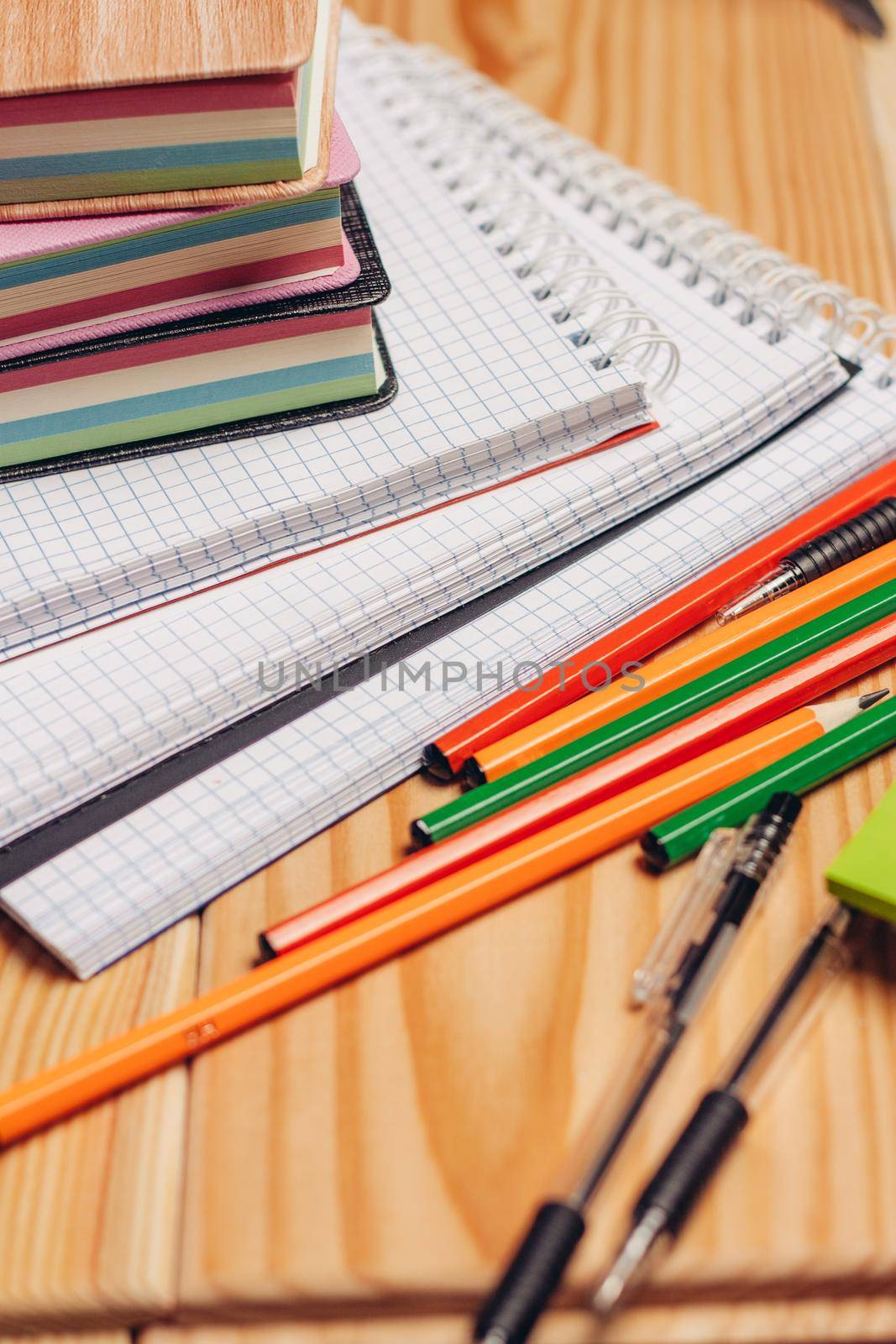 colorful stickers notepads pencils office desk close-up by SHOTPRIME