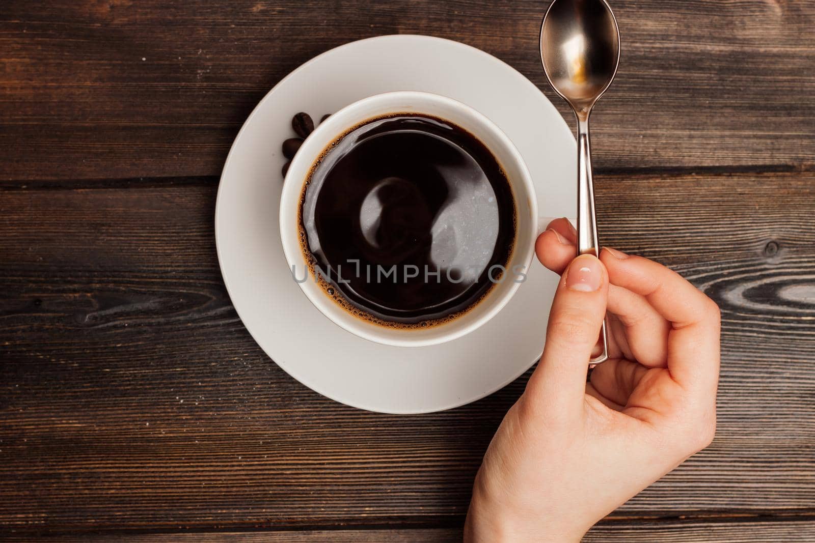 cup of coffee on a wooden table sweets breakfast top view. High quality photo