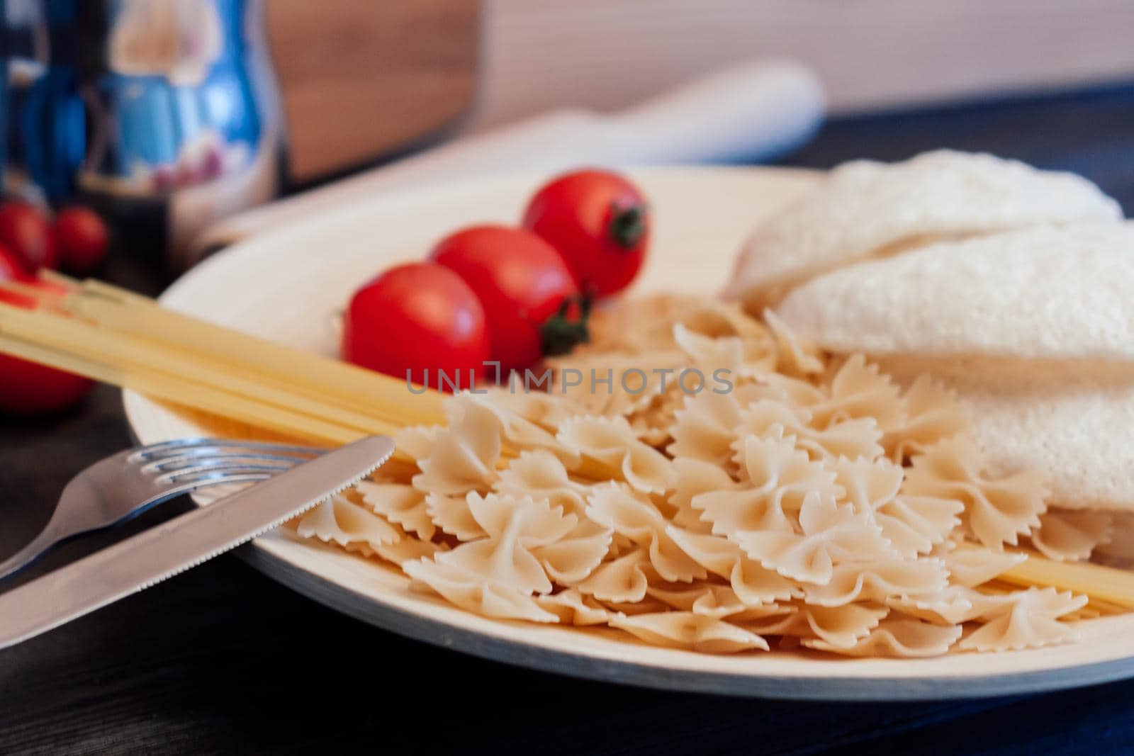 cherry tomatoes pasta ingredients for cooking italian cuisine. High quality photo