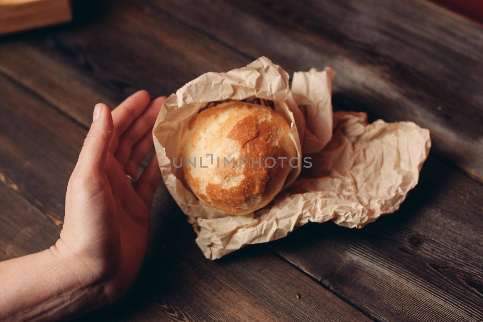 loaf of bread flour product wooden board tray and paper packaging. High quality photo