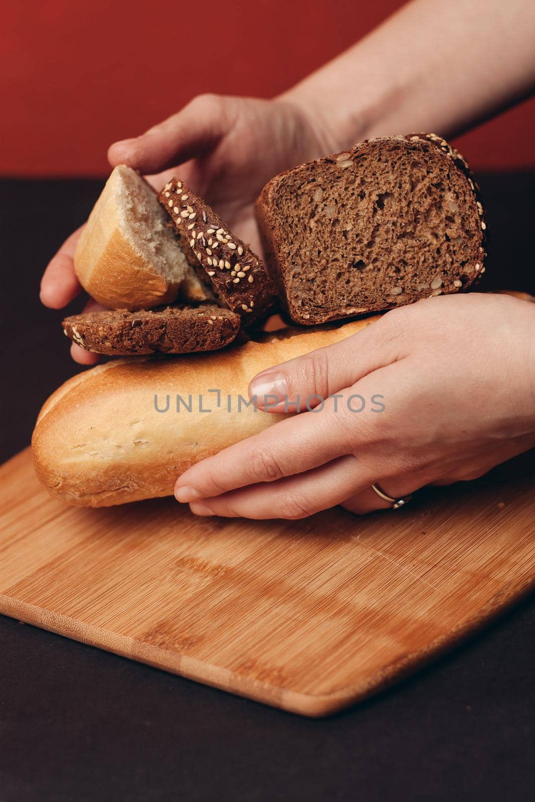 flour products loaf of bread baguette and pastries on wooden board. High quality photo