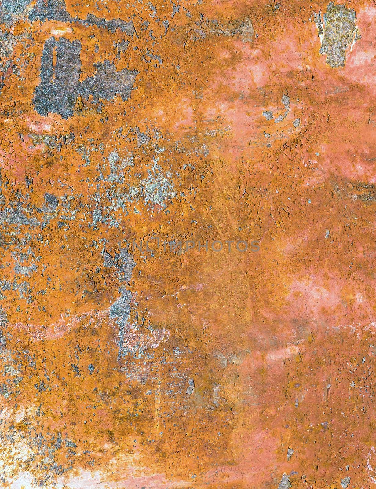 Vertical rusty metal background. Rusted metal plate with peeling paint. Severe metal corrosion. Grungy texture. Background series.