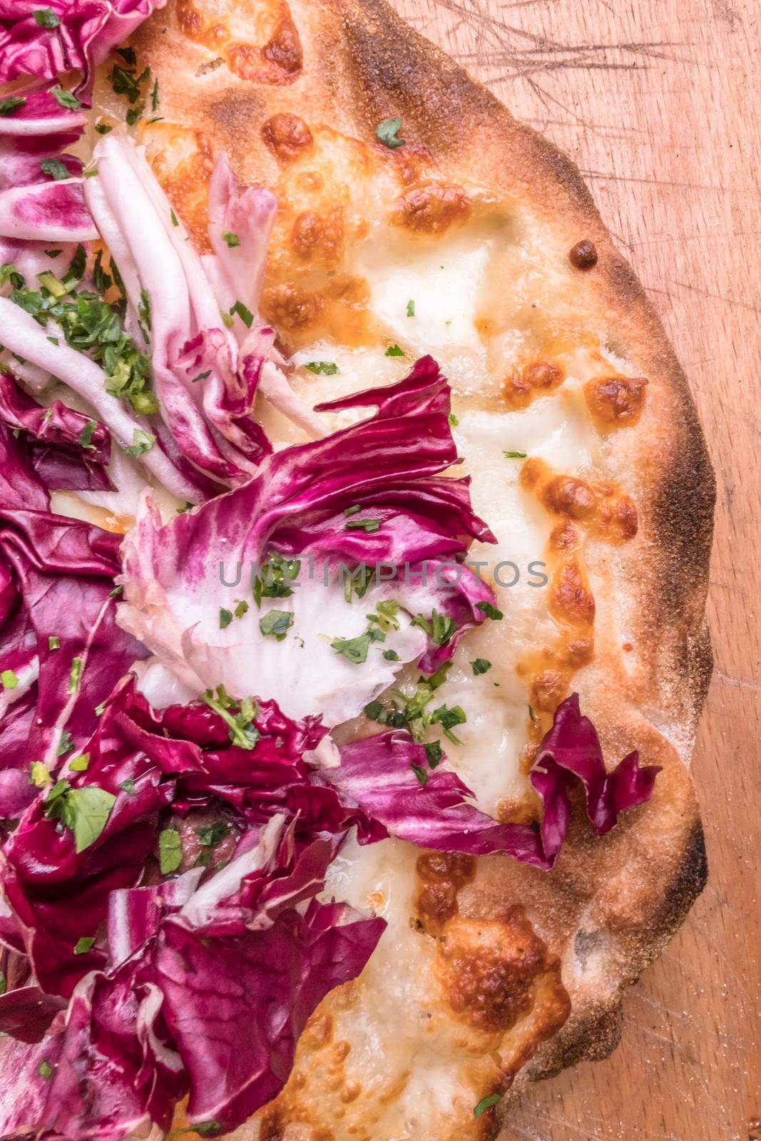 Italian pizza with mozzarella and radicchio