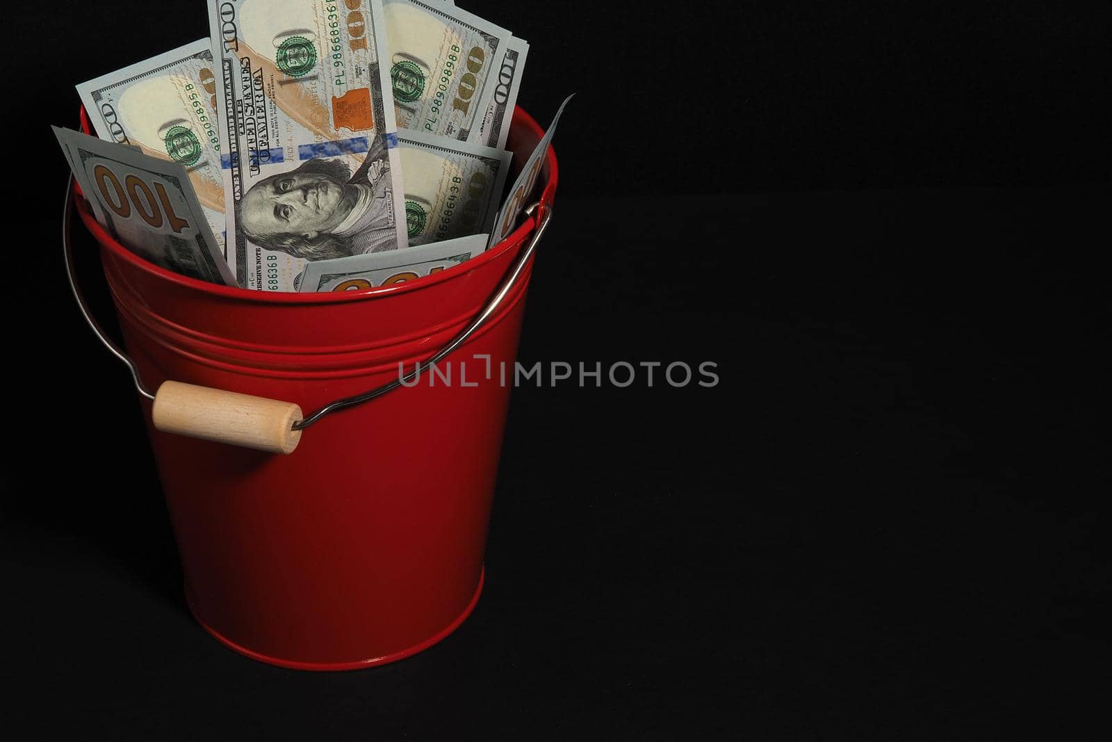 The American dollar. Business and finance. Paper bills, a lot of money. Isolated on a black background. High quality photo