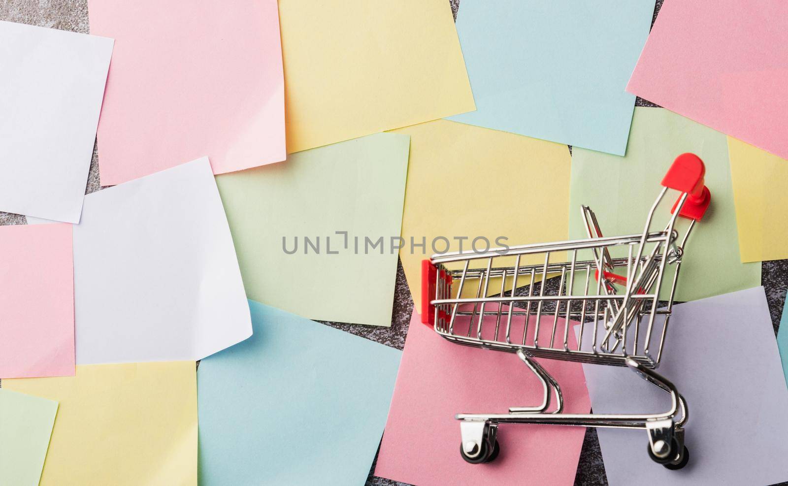 blank paper stick note list with the shopping cart by Sorapop