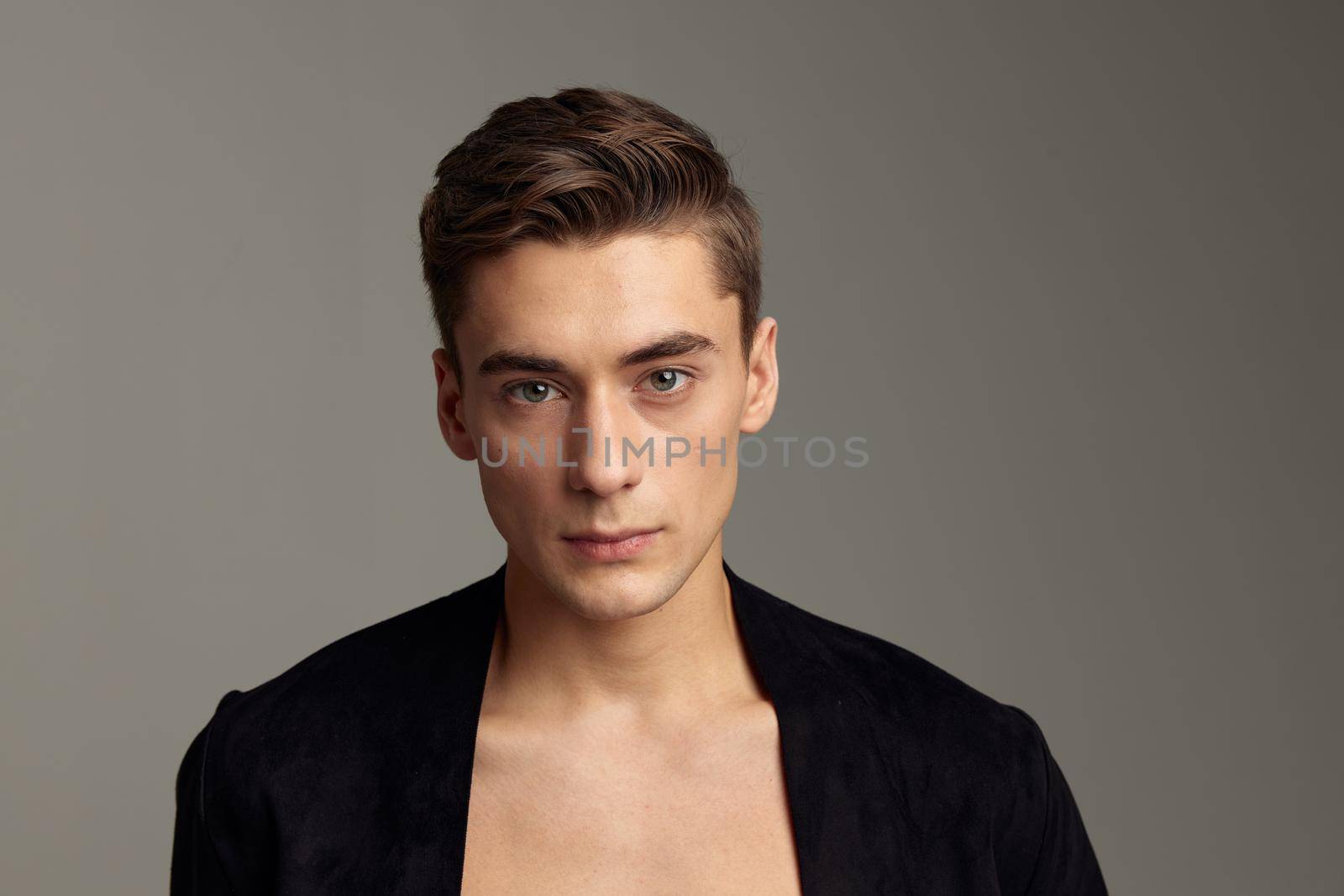 Handsome man fashionable hairstyle closeup attractiveness gray background by SHOTPRIME