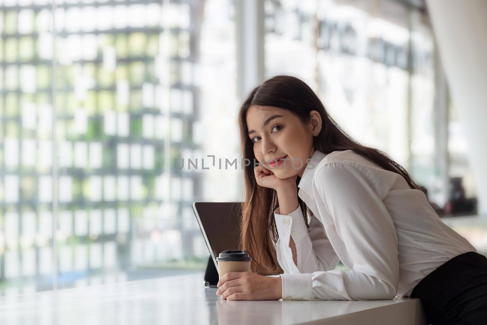 Portrait Of Attractive Asian Business working woman in office