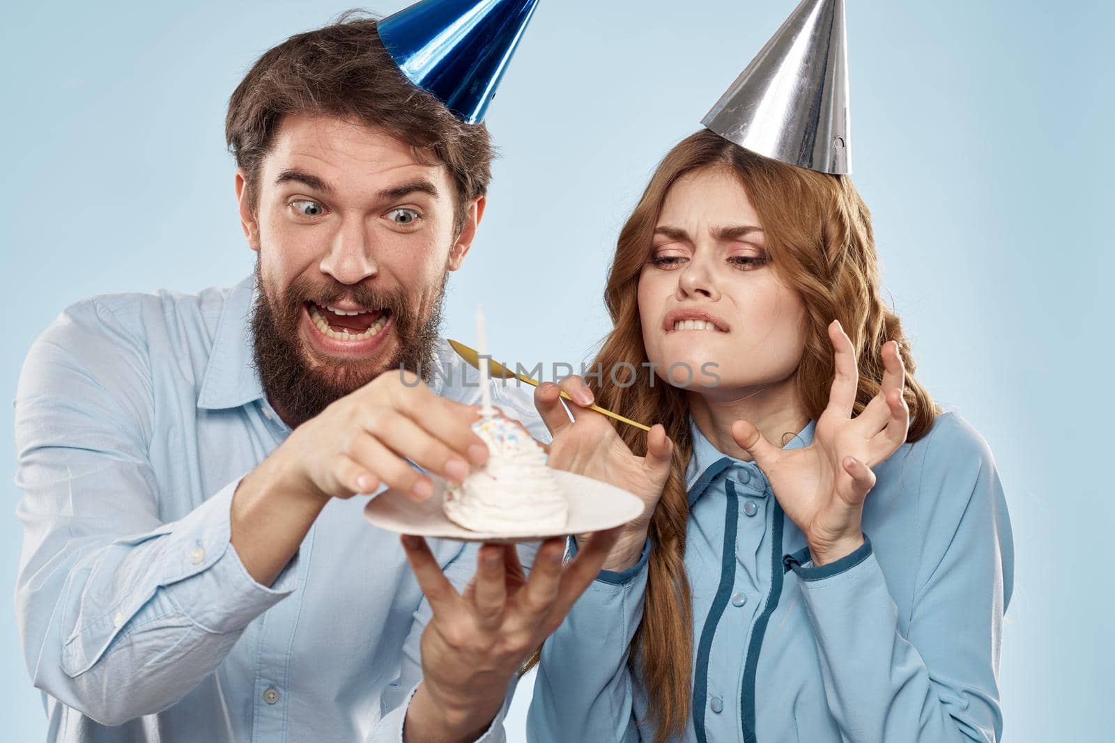 happy couple birthday surprise decoration cake blue background. High quality photo