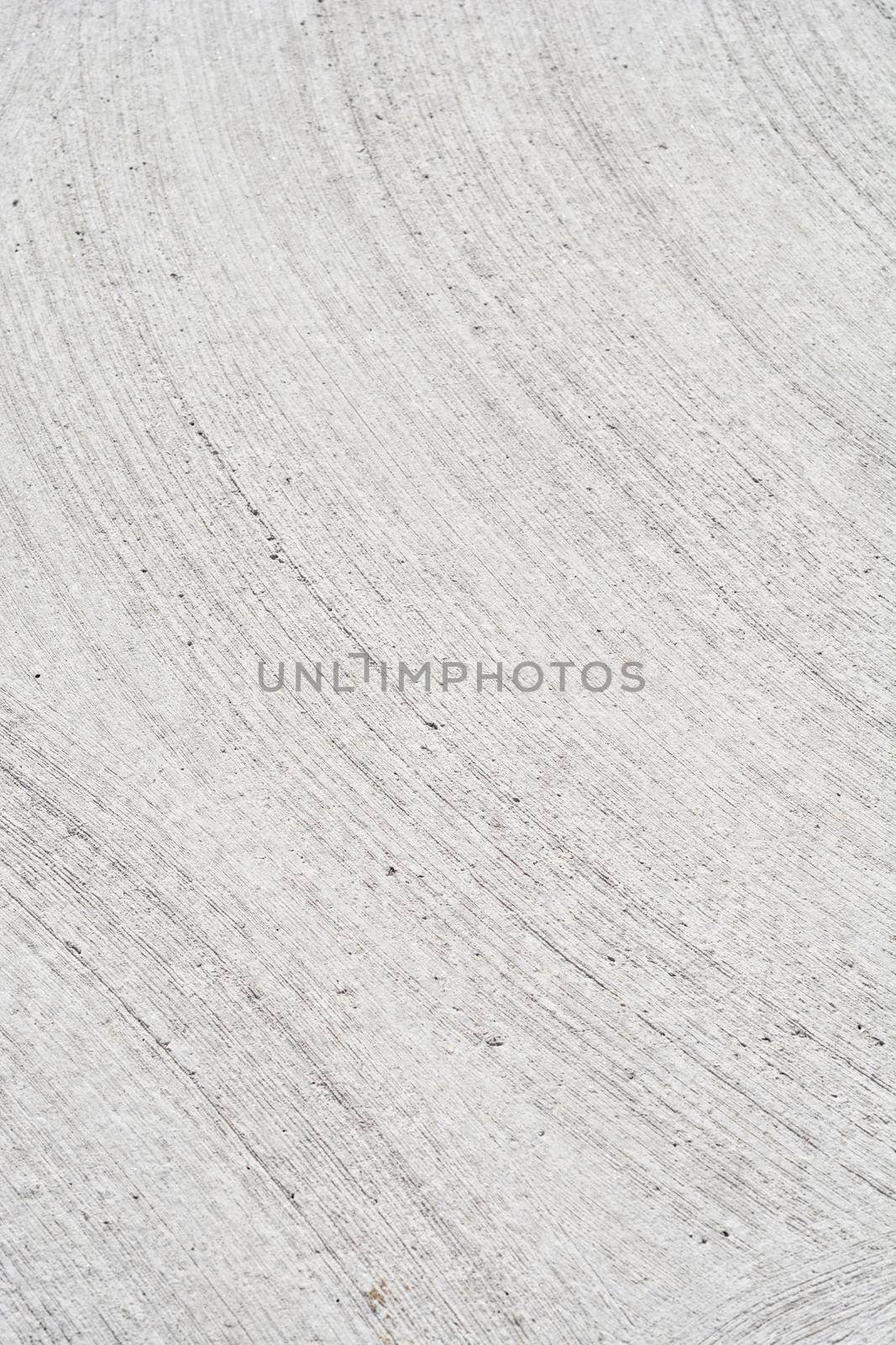 Detail of a white rough concrete floor