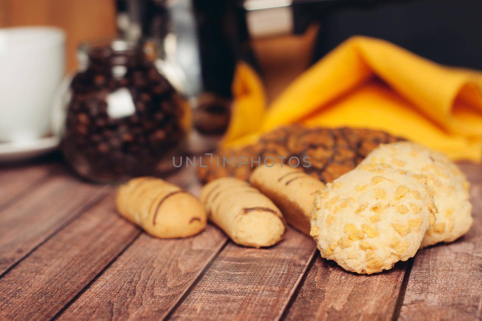 a cup of coffee cookies sweets wooden table snack. High quality photo