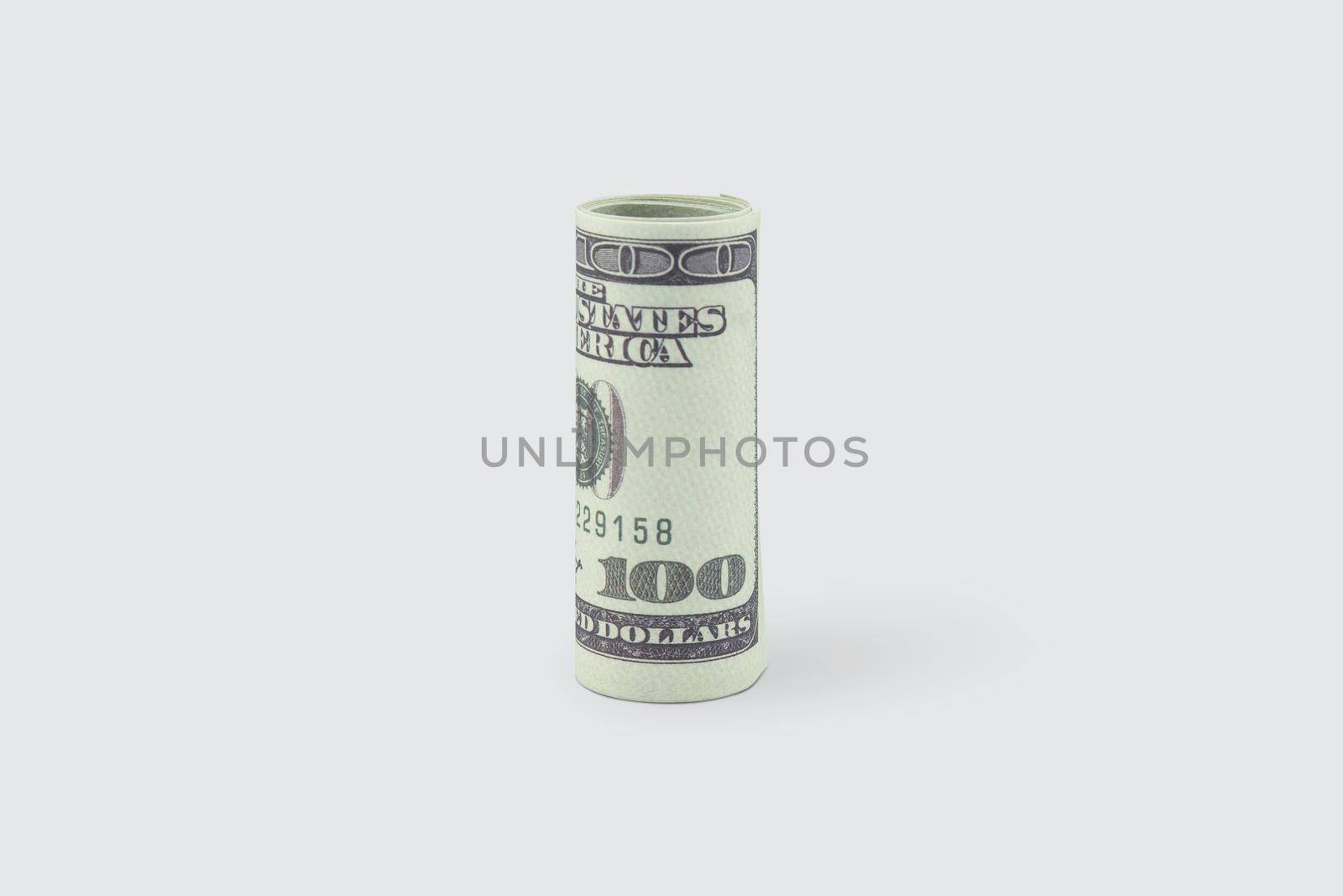 Closeup banknote currency dollar isolated on white background, finance and saving, deposit and debt, economic and exchange, tax and revenue, bookkeeping and budget, business concept.