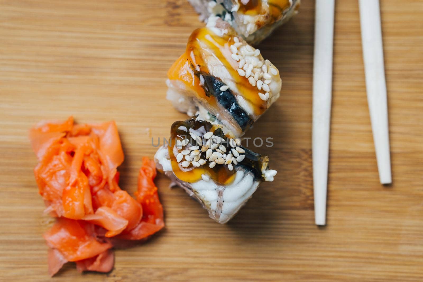 sushi chopsticks japanese cuisine red ginger top view. High quality photo