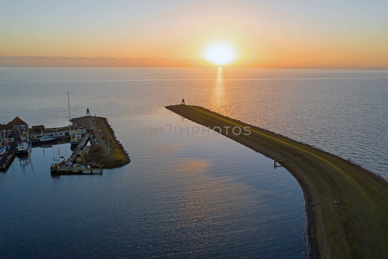 Aerial from the lighthouse from Stavoren at the IJsselmeer in the Netherlands at sunset by devy