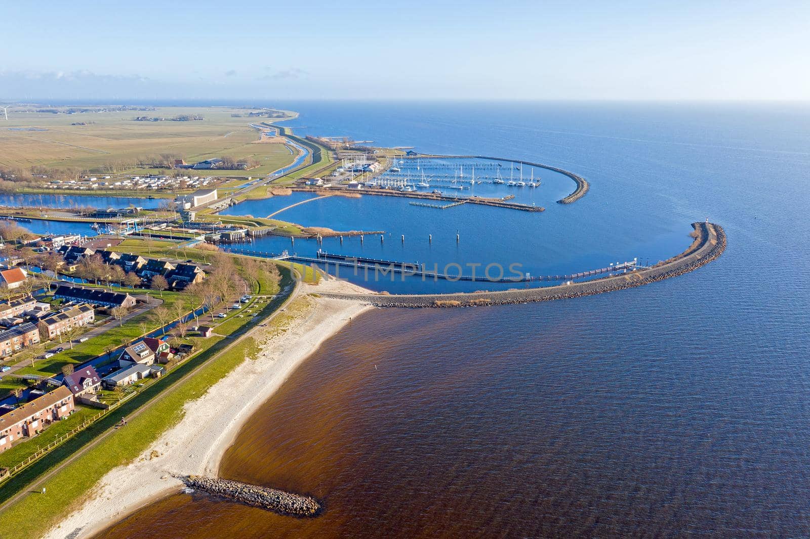 Aerial from the harbor and city Stavoren at the IJsselmeer in the Netherlands by devy